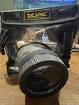 Dicapac WP-S10 Dslr Camera Series Waterproof Case Built-in Finger Sleeve. Fixed Price $15.00.