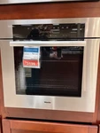 H7180BPCTS-17-5634-MIELE 30" Contourline Single Walloven Stainless Display. Fixed Price $3199.00.