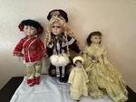 Lot Of 4 Dolls Unsure Brand Used In Good Condition. Fixed Price $20.00.