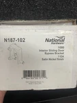 National Hardware N187-102 Interior Sliding Door Bypass Bracket Satin Nickel. Fixed Price $20.36.