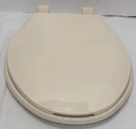 Centoco Elongated Closed Front Plastic Toilet Seat, DS1600-106, Bone, New. Fixed Price $12.99.